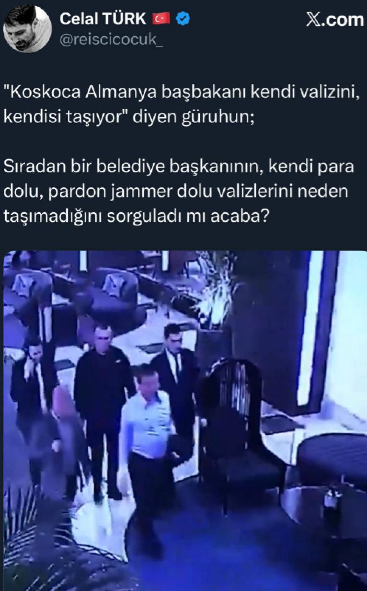 Almanya Başbakanı'nın Valiz Taşıma Anı Sosyal Medyada Gündem Oldu